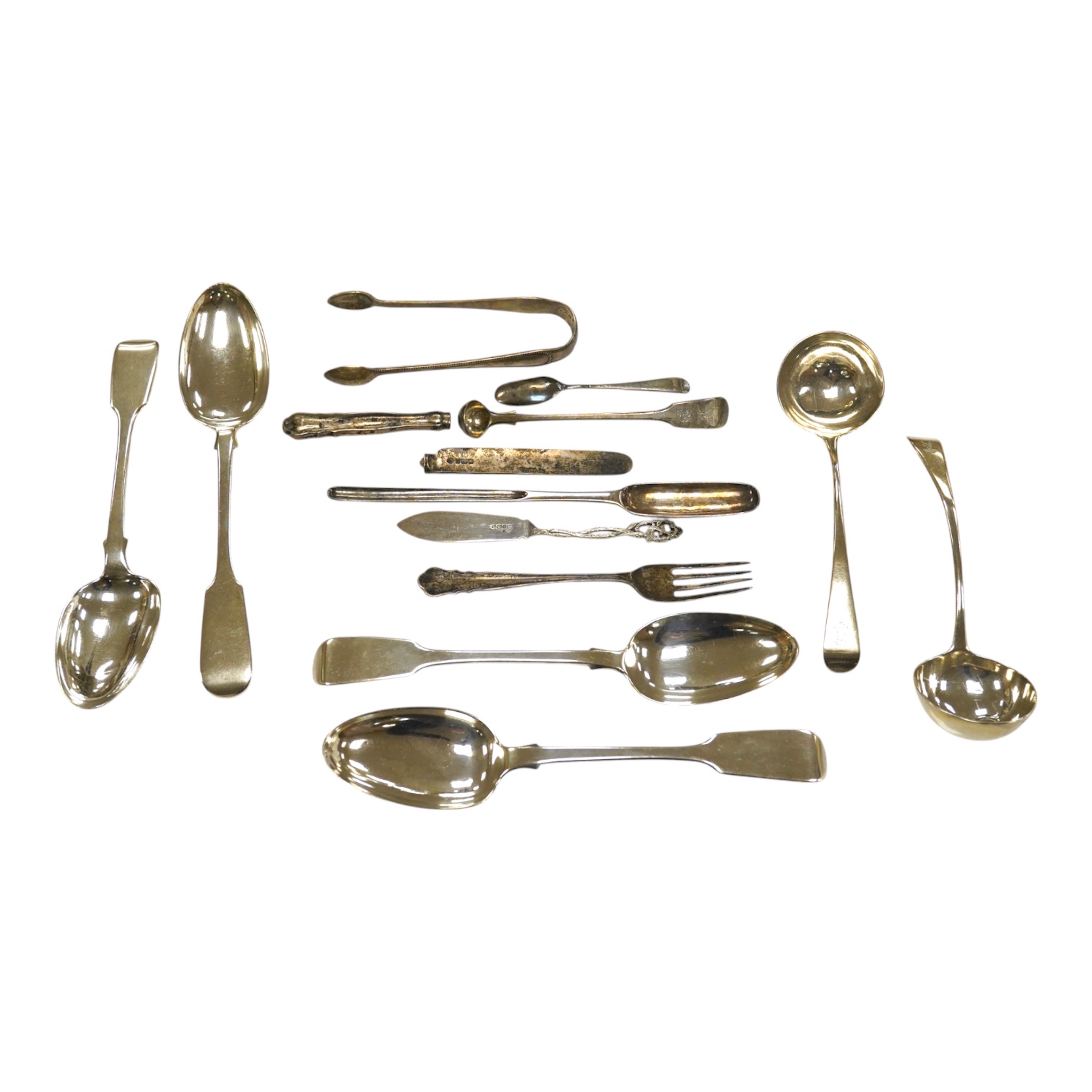 A set of three Victorian silver tablespoons, by Elizabeth Eaton, London, 1854, one other Victorian silver tablespoon, a pair of George III sauce ladles, London, 1790 and sundry silver flatware, including an 18th century